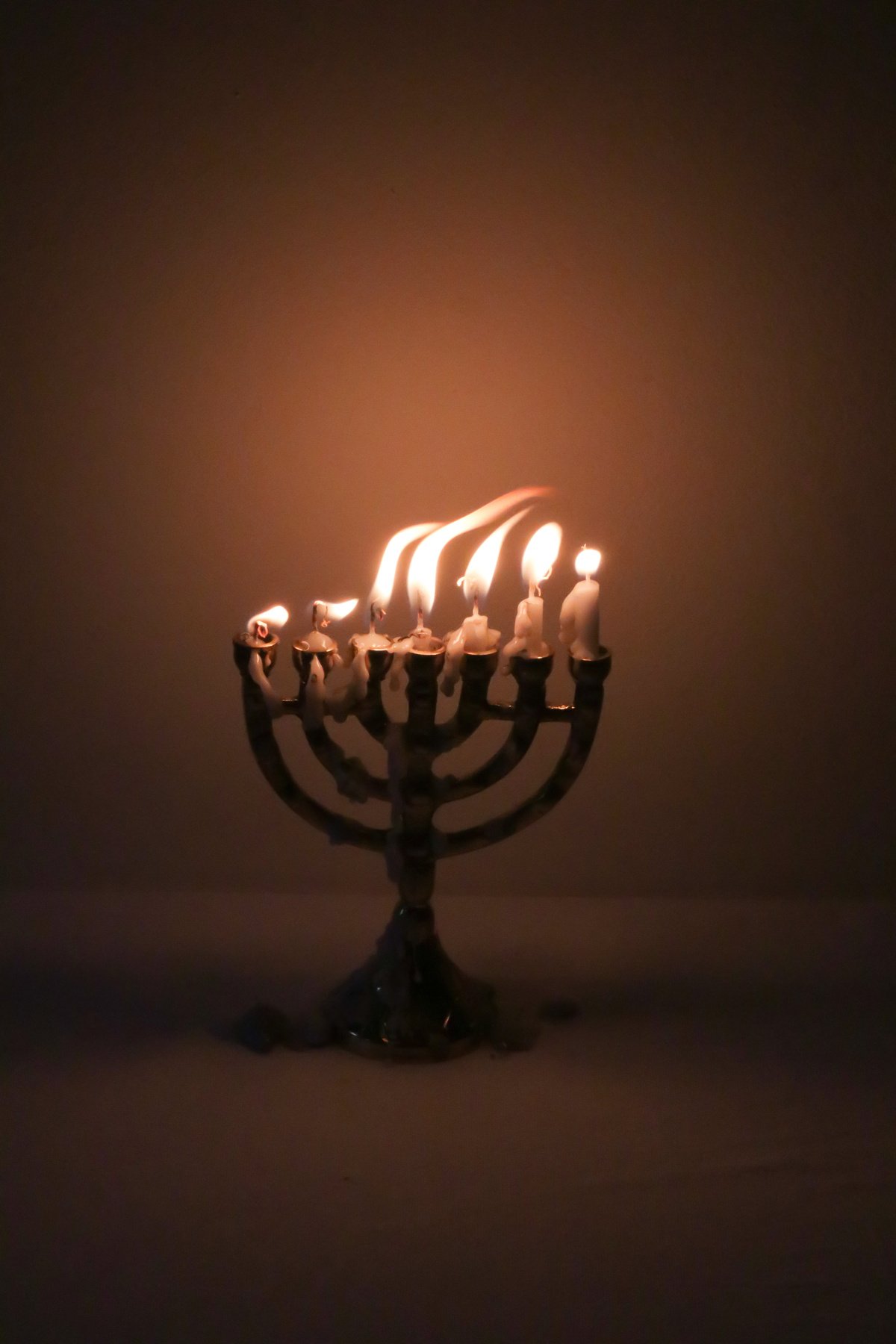 Lighted Candle On A Candle Holder